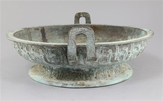 A Chinese archaic bronze ritual water basin, Pan, early Eastern Zhou dynasty, 8th-7th century B.C., 15cm high, 40.5cm, old repairs